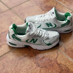 Size 9.5 Men’s And Women’s 11 - New Balance Kids' Sneakers in White and Green